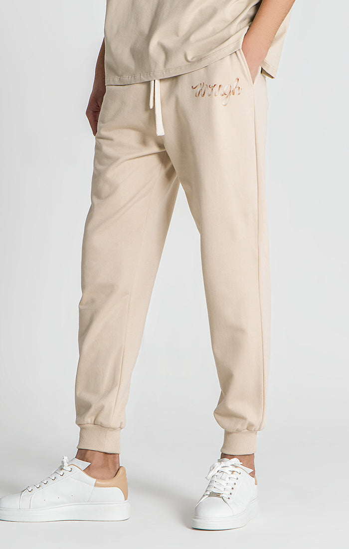 Outfit para hombre estilo joggers con pantalón beige 】